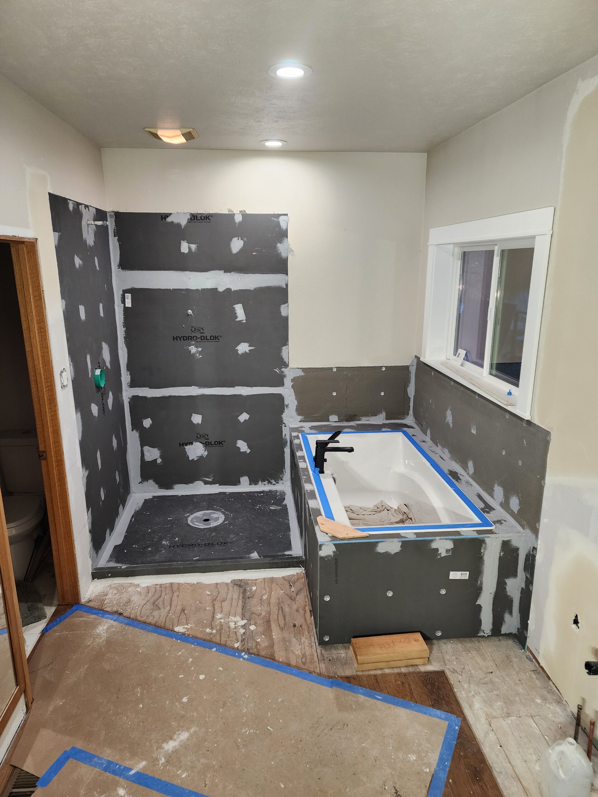 Full bathroom remodel in Northern Idaho with tile flooring and custom finishes
