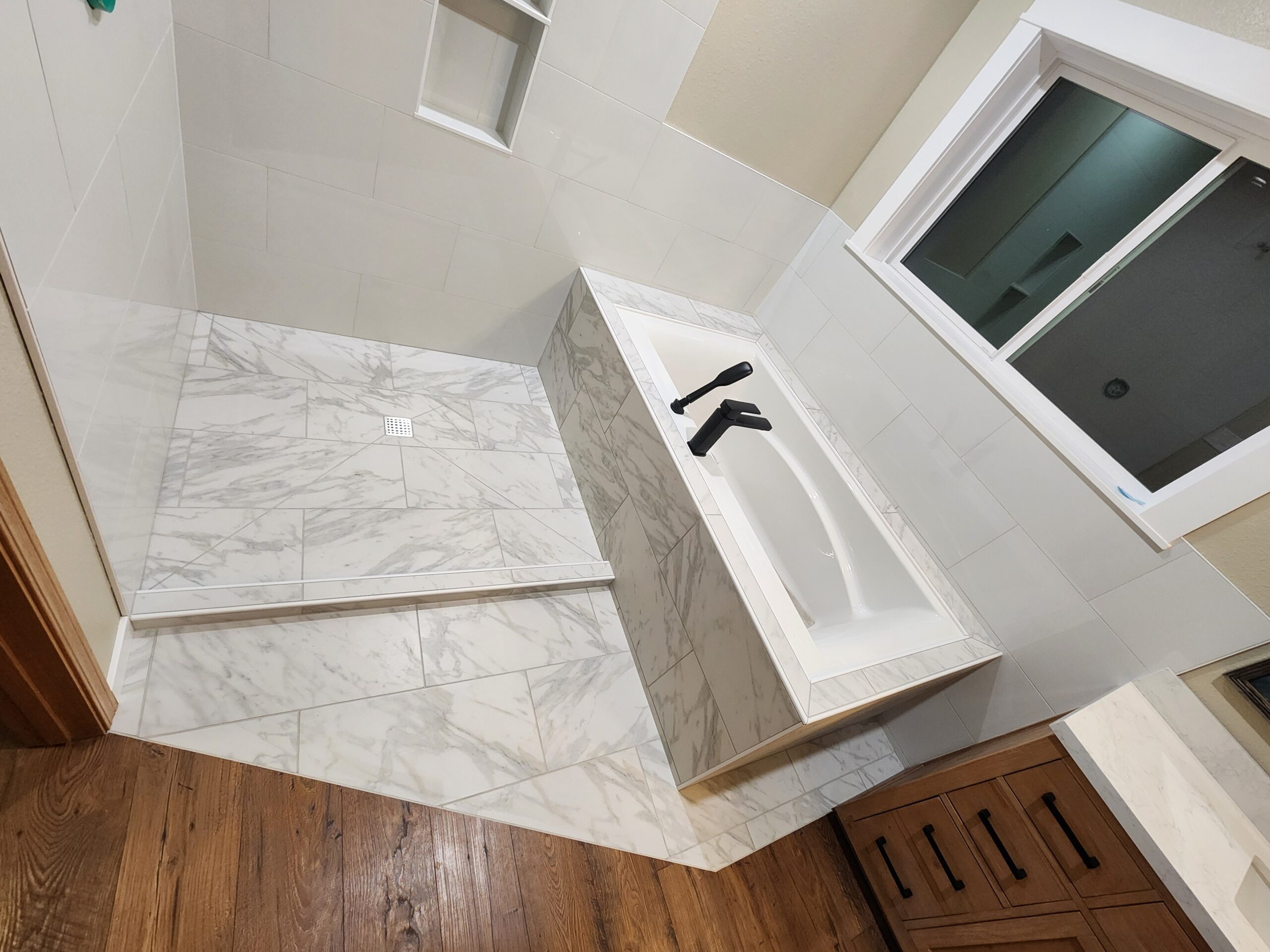 Custom bathroom remodel with detailed tile installation