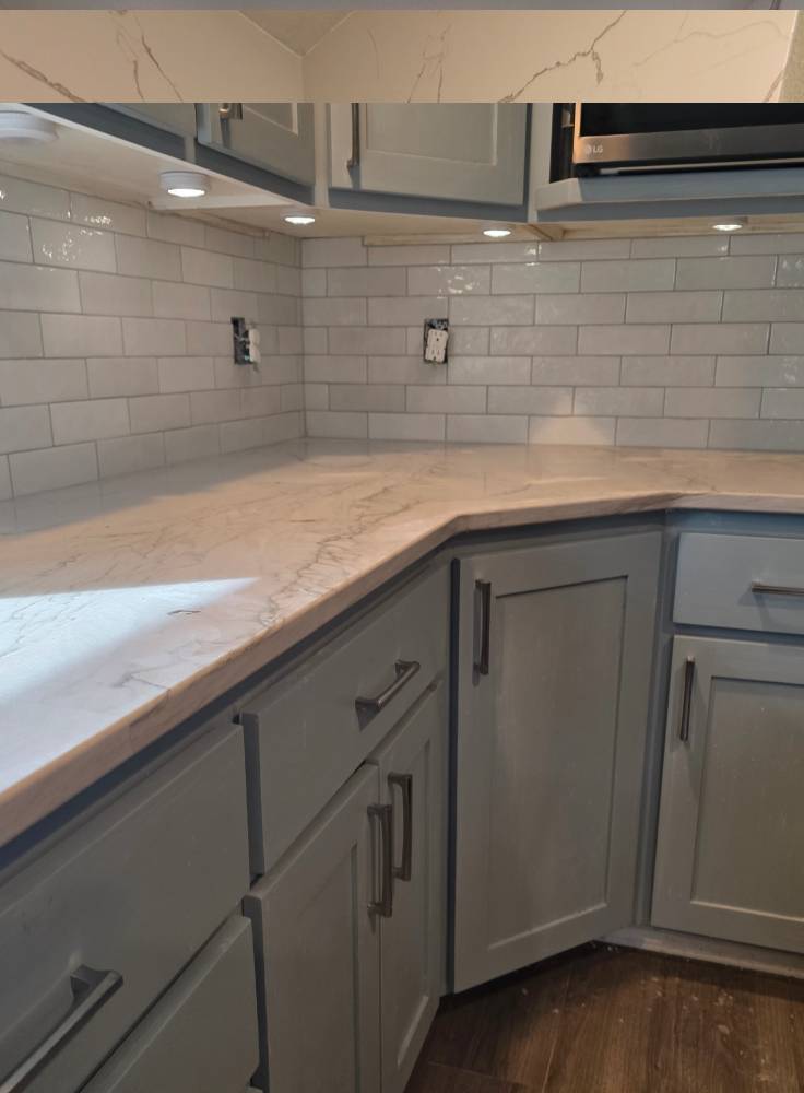 Tile flooring installation in a bathroom remodel