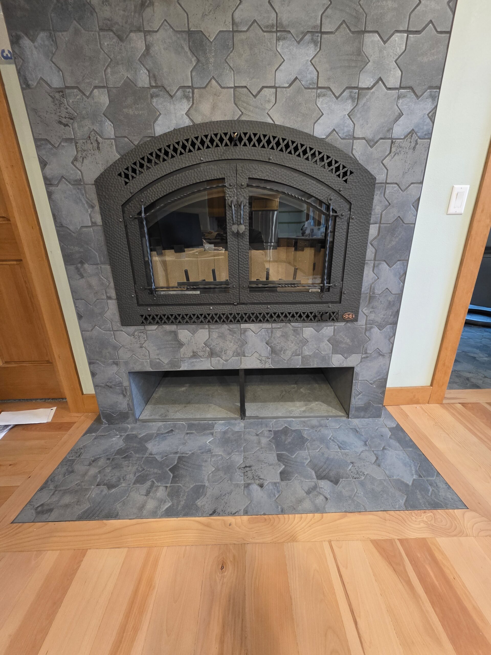 Custom tile fireplace surround in a Northern Idaho home