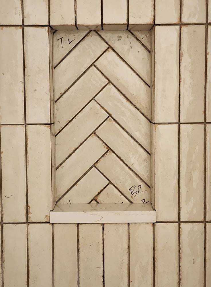 Custom tile niche detail in a walk-in shower remodel